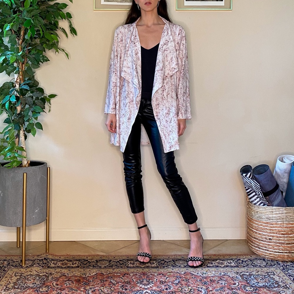 Pink snakeskin duster jacket by Amaryllis